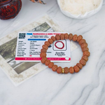 7 Mukhi Rudraksha Bracelet with 9mm beads, hand-strung on stretchable thread and lab certified for authenticity and energy benefits