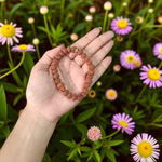 7 Mukhi Rudraksha Bracelet with 9mm beads, hand-strung on stretchable thread and lab certified for authenticity and energy benefits