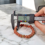 7 Mukhi Rudraksha Bracelet with 9mm beads, hand-strung on stretchable thread and lab certified for authenticity and energy benefits