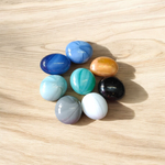 A colorful set of 8 milky round glass pebbles in multicolor, arranged on a white background – ideal for decoration, aquariums, and vases