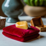 A handcrafted Yellow Aventurine stone pendant with a polished oval gemstone set in a sleek metal frame, suitable for men and women