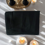 Black cotton pooja cloth (1.25 meter) neatly folded, ideal for spiritual rituals and deity worship