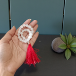 Close-up image of a premium 108+1 bead Sphatik (Crystal) Mala with 8MM beads, hand-knotted, radiant clear quartz beads, laid out on a white background