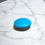 Close-up image of an Original Turquoise (Firoza) Stone with smooth polish and natural color patterns, ideal for healing and confidence
