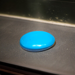 Close-up image of an Original Turquoise (Firoza) Stone with smooth polish and natural color patterns, ideal for healing and confidence