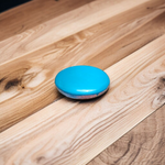 Close-up image of an Original Turquoise (Firoza) Stone with smooth polish and natural color patterns, ideal for healing and confidence