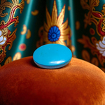 Close-up image of an Original Turquoise (Firoza) Stone with smooth polish and natural color patterns, ideal for healing and confidence