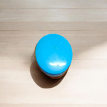 Close-up image of an Original Turquoise (Firoza) Stone with smooth polish and natural color patterns, ideal for healing and confidence