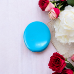 Close-up image of an Original Turquoise (Firoza) Stone with smooth polish and natural color patterns, ideal for healing and confidence