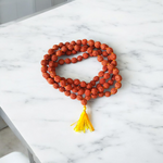 Combo set of Kamal Gutta Mala and Rudraksha Mala with 108+1 beads each, used for mantra chanting, meditation, and spiritual rituals