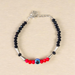 Evil Eye Anklet for Kids featuring black and red beads with stretchable design, ideal for daily wear and spiritual protection
