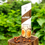 Hand-rolled Sandalwood incense sticks with traditional packaging, placed next to a bronze incense holder and decorative flowers