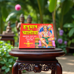 Hanuman Chalisa Hindi Book with colourful pages and devotional cover art placed near diya and flowers