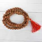Image of 4 Mukhi Rudraksha Mala from Malawala, showcasing natural beads in 27+1 and 108+1 variants with certification