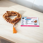 Image showing a set of 4 Jaap Malas – Rudraksha, White Sandalwood, Sphatik, and Red Sandalwood – neatly arranged on a traditional spiritual cloth