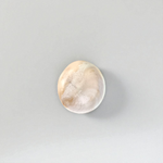 Image showing a set of two large Gomati Chakras with natural spiral patterns, placed on a white cloth, ideal for Puja and decoration