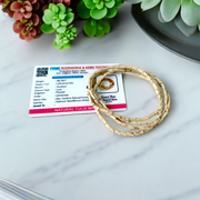 Lab-certified natural Tulsi mala with small round beads, traditionally knotted and displayed on a soft spiritual background