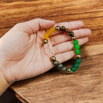 Money Magnet Bracelet with 8mm polished beads made from wealth-attracting stones like Citrine and Pyrite, stretchable for men and women