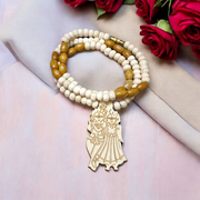 Radha Krishna Tulsi Chandan Mala featuring alternating Tulsi and sandalwood beads, engraved pendant, and screw-lock clasp, displayed neatly