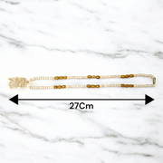 Radha Krishna Tulsi Chandan Mala featuring alternating Tulsi and sandalwood beads, engraved pendant, and screw-lock clasp, displayed neatly