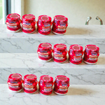 Red chandan paste container used for tilak, puja, and religious ceremonies