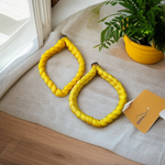 Set of 2 Handmade Yellow Raksha Sutra Bracelets with adjustable cotton thread, designed for spiritual protection and daily wear