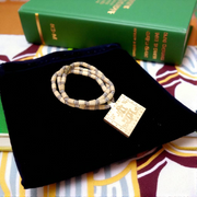 Shri Ram Locket in Tulsi Beads Mala with screw-lock clasp, placed neatly on a neutral background