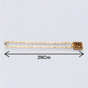 Tulsi Mala featuring Shri Bageshwar Dham Locket engraved with Jai Sita Ram and secure screw lock, placed neatly for display