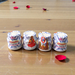 White chandan paste container used for tilak, puja, and religious ceremonies