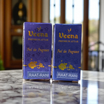 1ML bottle of Raat Rani Attar with applicator placed beside night-blooming jasmine flowers and diya lamp on a wooden altar