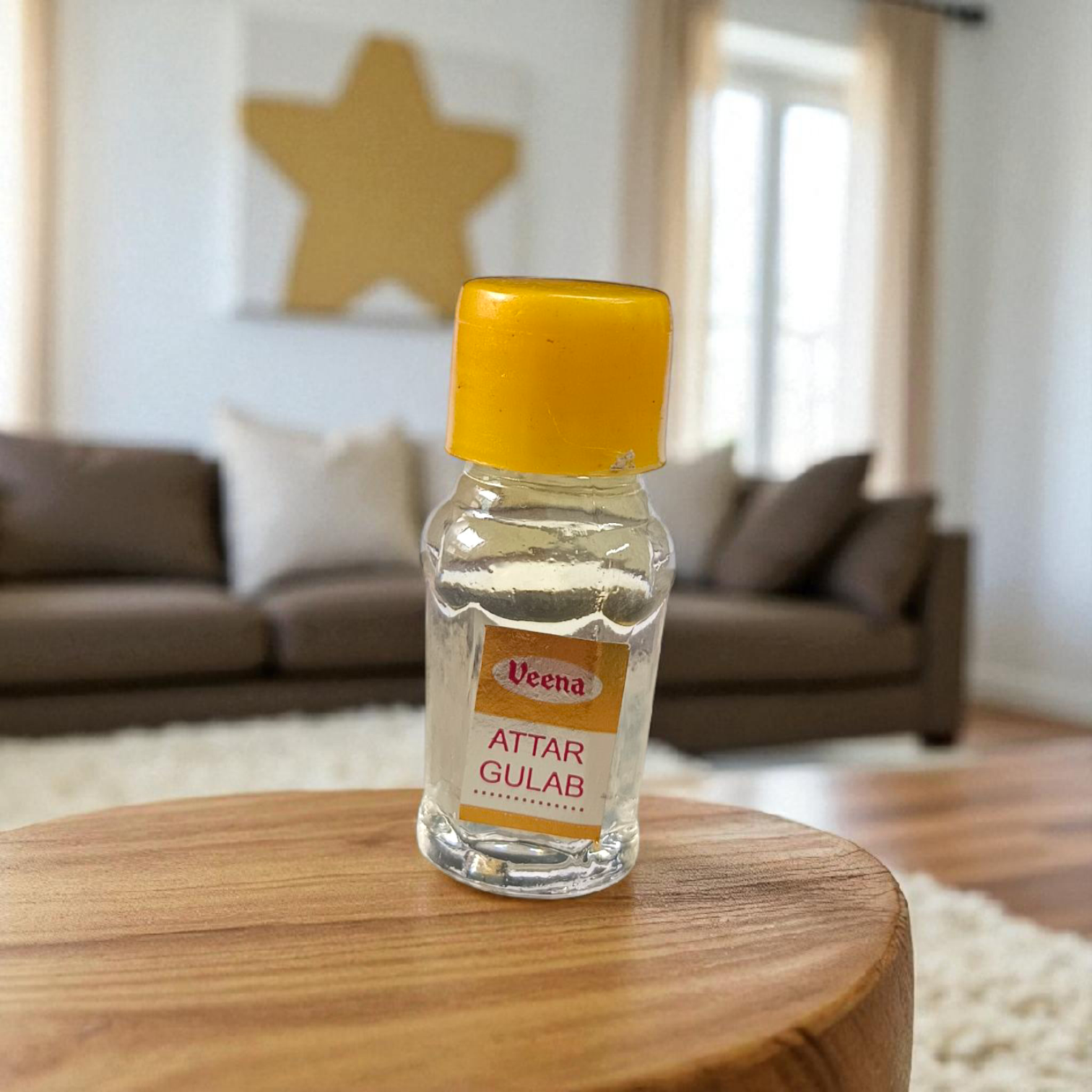 2ML bottle of Gulab Attar by Veena, a handcrafted rose perfume for spiritual and daily use, placed with rose petals
