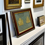A 7x7 inch wooden frame with a divine image of Lakshmi and Ganesha, embedded with raw Pyrite stone, ideal for wealth, success, and Vastu correction