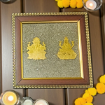 A 7x7 inch wooden frame with a divine image of Lakshmi and Ganesha, embedded with raw Pyrite stone, ideal for wealth, success, and Vastu correction