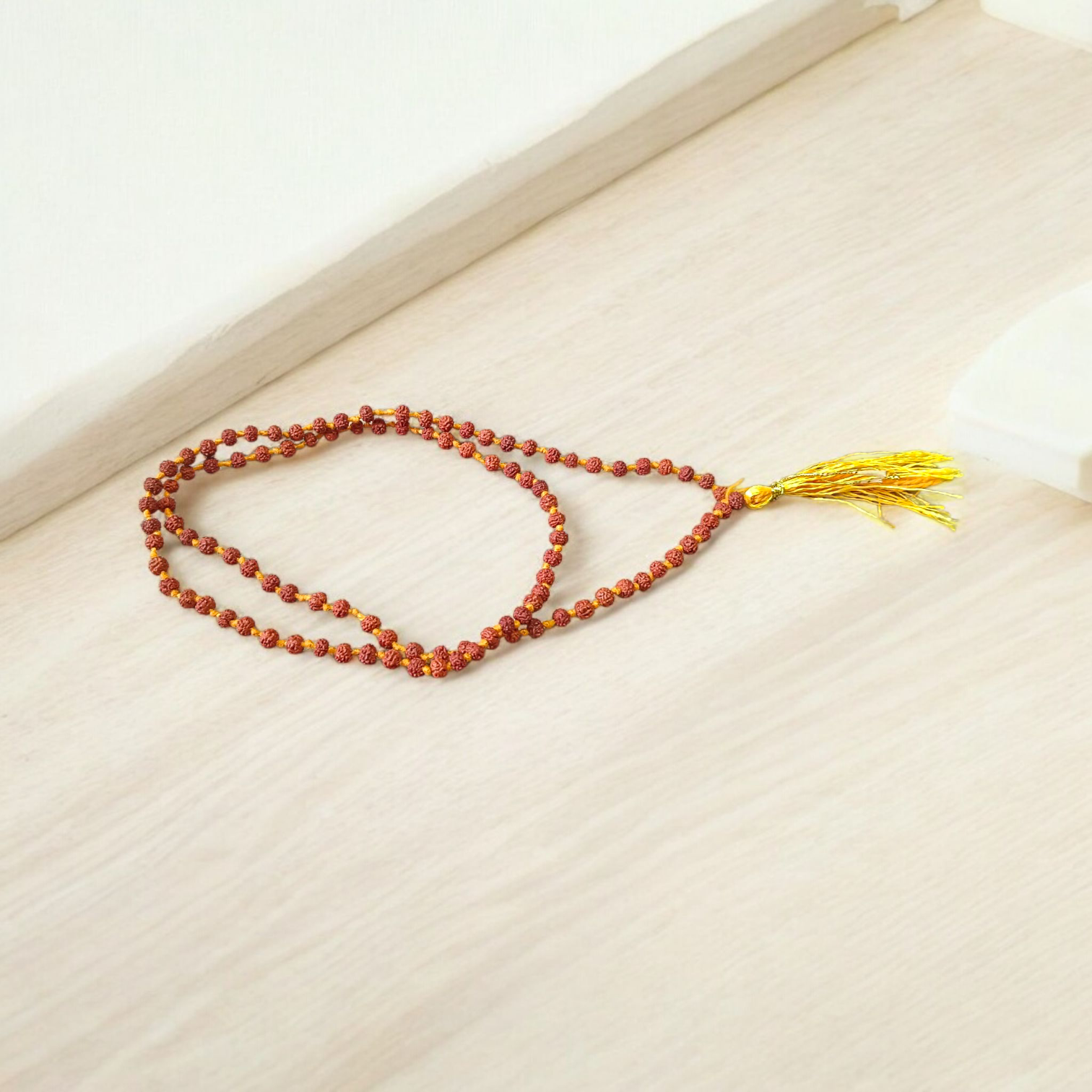 A Lab Certified 5 Mukhi Rudraksha Mala featuring 108+1 small 4mm natural Rudraksha beads, hand-knotted for japa and meditation