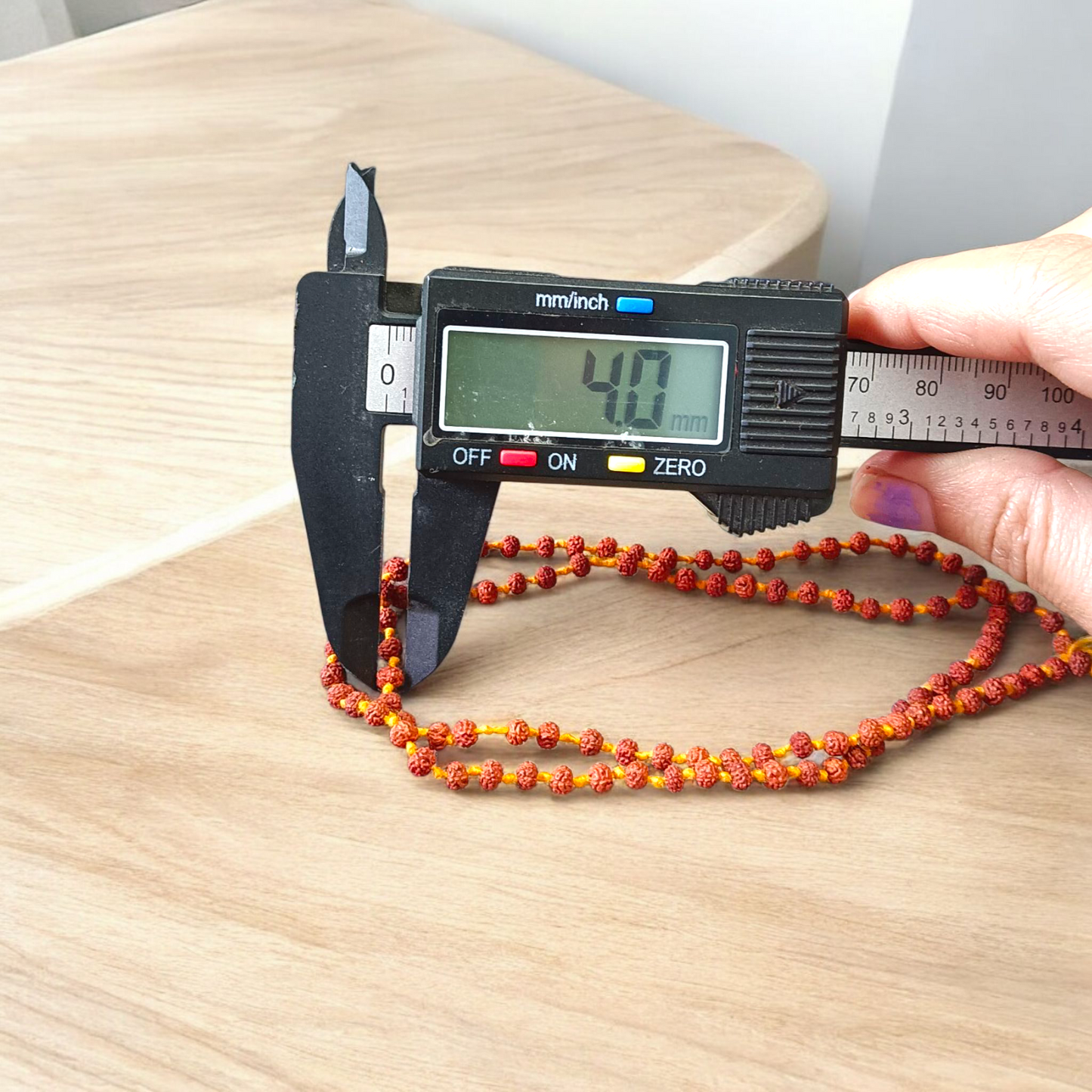A Lab Certified 5 Mukhi Rudraksha Mala featuring 108+1 small 4mm natural Rudraksha beads, hand-knotted for japa and meditation