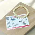 A beautiful 8mm stretchable natural pearl bracelet featuring round, white freshwater pearls on an elastic cord, ideal for healing and style