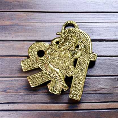 A beautifully crafted brass wall hanging of Lord Ganesha in 11×11 cm size, ideal for temple, home entrance, or office wall décor