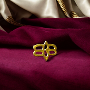 A brass Tripund With Third Eye Tilak Stamp showing three horizontal lines and a third eye symbol, handcrafted for precise forehead application