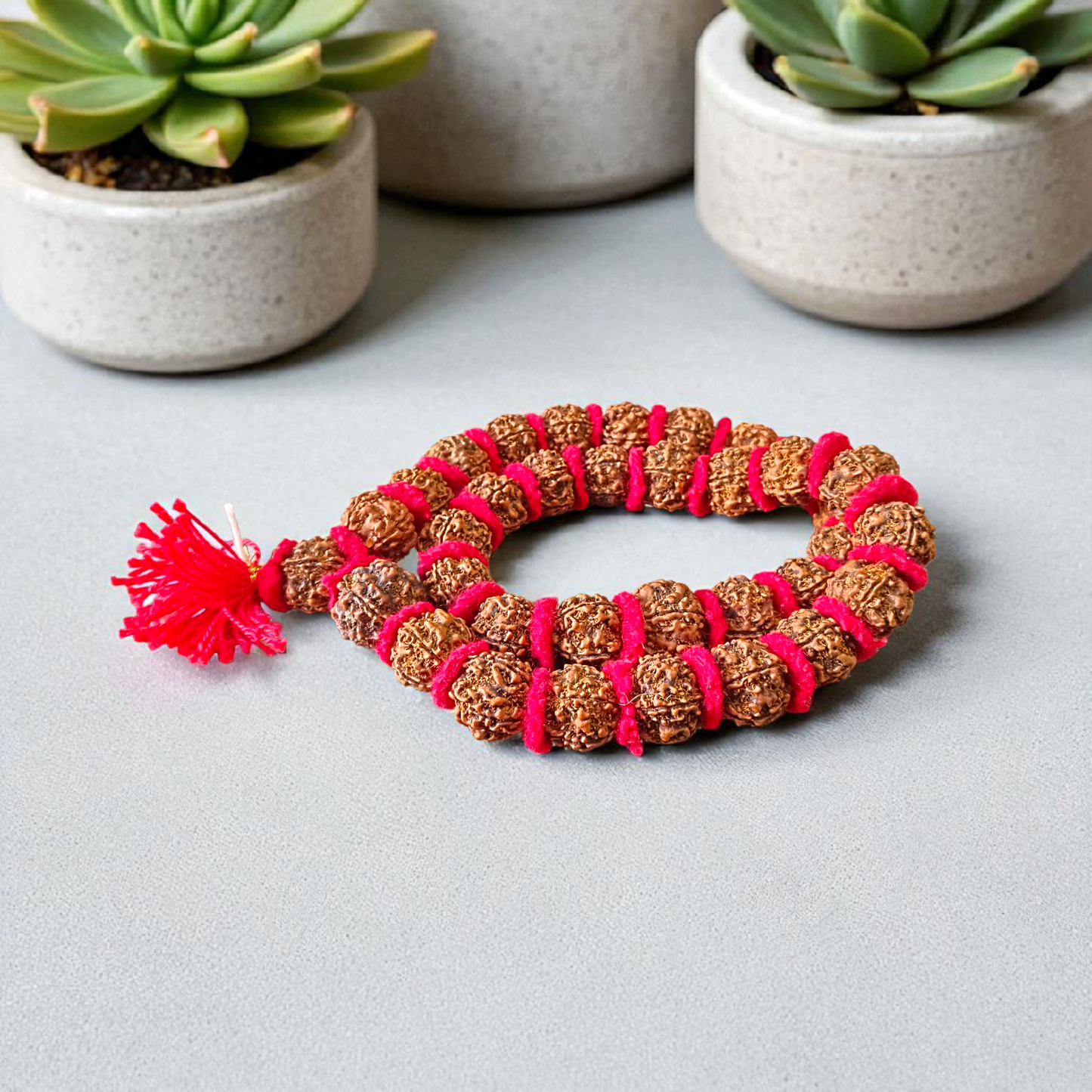 A combo set featuring a hand-knotted Rudraksha velvet Kanth Mala and a silver-capped 2 Mukhi Rudraksha pendant, both lab certified
