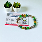 A handcrafted 8mm beaded Money Magnet Bracelet by MALAWALA featuring natural gemstone beads, designed to attract wealth and prosperity, displayed on a neutral background