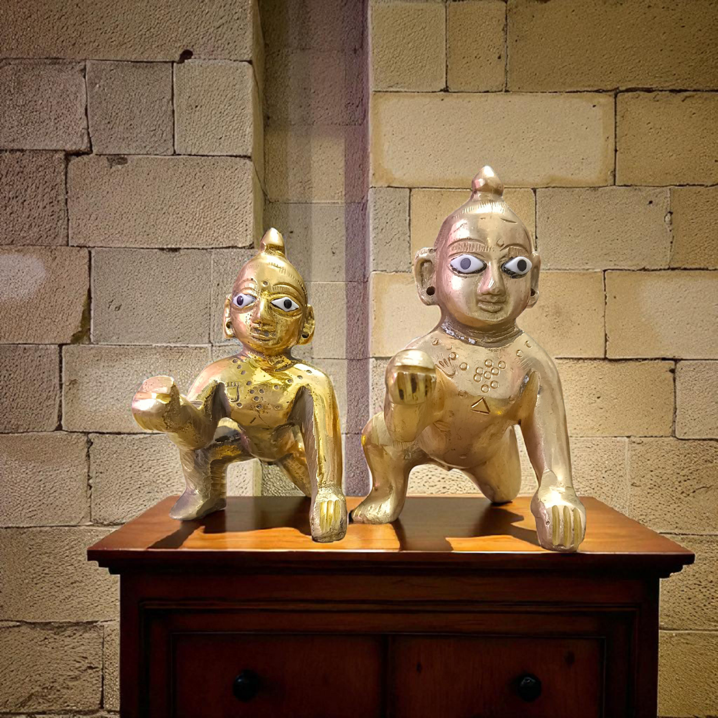 A handcrafted brass Laddu Gopal statue in crawling pose, available in sizes 0 to 6, ideal for temple and home worship