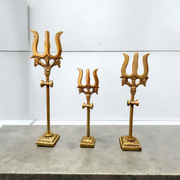 A handcrafted brass Trishul with Damru symbolizing Lord Shiva, ideal for home décor, temple altar, or spiritual gifting