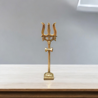 A handcrafted brass Trishul with Damru symbolizing Lord Shiva, ideal for home décor, temple altar, or spiritual gifting