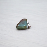 A natural Green Aventurine (African Green Jade) pendant with a polished finish, attached to a metal chain—ideal for men and women’s spiritual wear