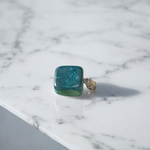 A natural Green Aventurine (African Green Jade) pendant with a polished finish, attached to a metal chain—ideal for men and women’s spiritual wear