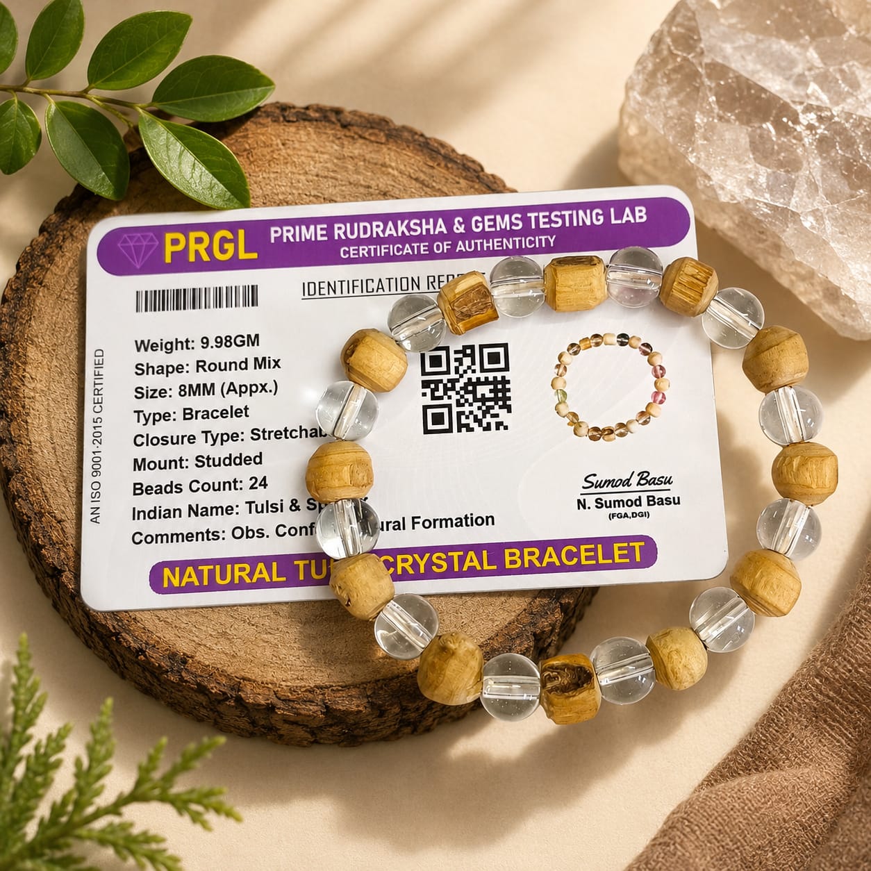 A natural Tulsi and Sphatik crystal bracelet with 8mm beads, handcrafted on stretchable cord, used for meditation and spiritual practice