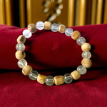 A natural Tulsi and Sphatik crystal bracelet with 8mm beads, handcrafted on stretchable cord, used for meditation and spiritual practice