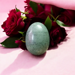 A natural greenish-black Shivling stone, hand-carved and polished, ideal for Tulsi plants, garden altars, and temple worship