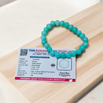 A polished natural blue chalcedony bracelet with 8mm round beads on an elastic stretchable cord, handcrafted for healing and style
