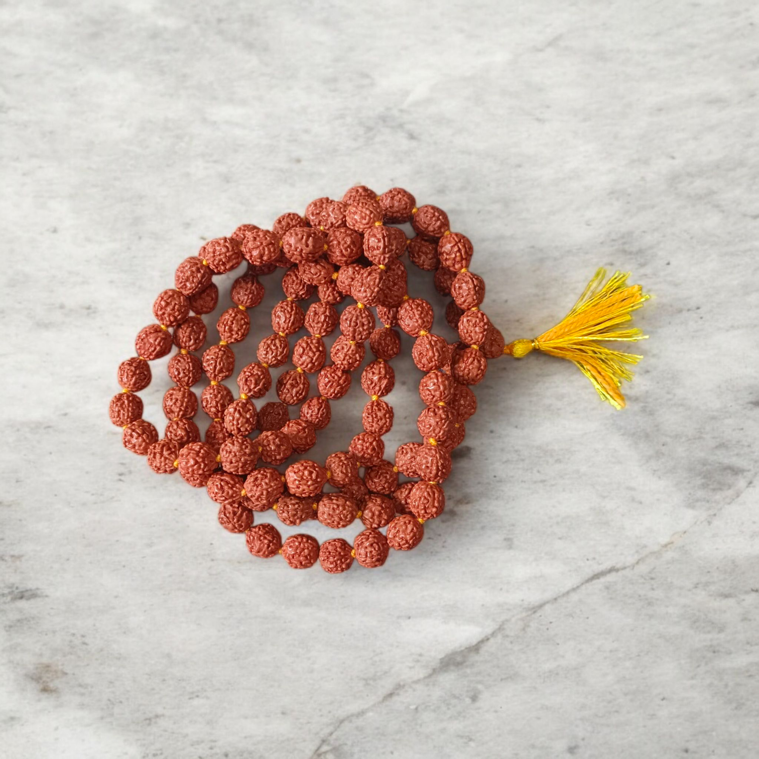 A spiritual combo featuring a 5 Mukhi Rudraksha Mala, a red velvet Pooja Aasan with golden border, and a traditional Gomukhi Japa Bag – all lab certified